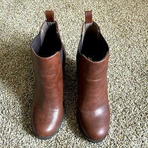 Brown and black booties